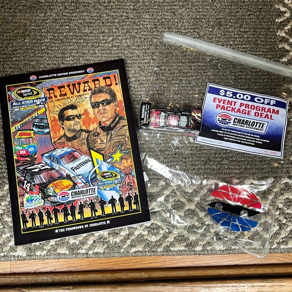 Richard Petty signed-Charlotte Motor Soeedway 5/12 Program & Matchbox Car Pack